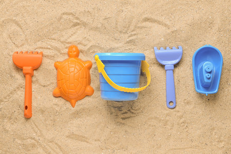 Set of beach toys for children on sandの写真素材