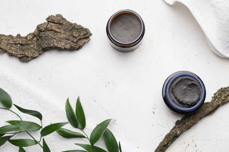 Composition with cosmetic clay on light backgroundの写真素材