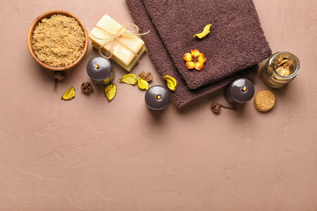Beautiful spa composition with burning candles on color background