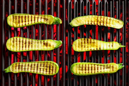 Tasty squashes cooking on grillの写真素材