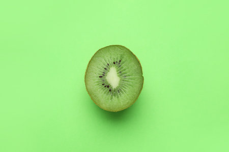 Tasty kiwi on color backgroundの写真素材