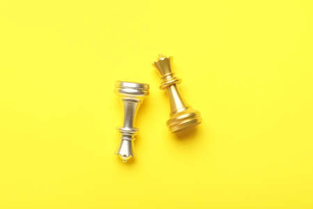 Chess pieces on color background