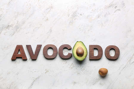 Composition with word AVOCADO on light background