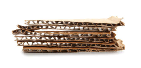 Pieces of cardboard on white background