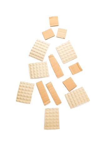 Christmas tree made of cardboard pieces on white backgroundの写真素材