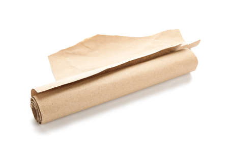 Rolled cardboard sheet on white backgroundの写真素材