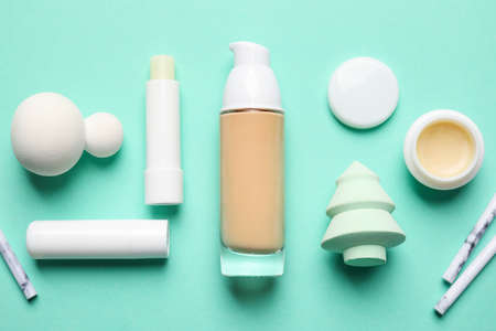 Makeup supplies on color backgroundの写真素材