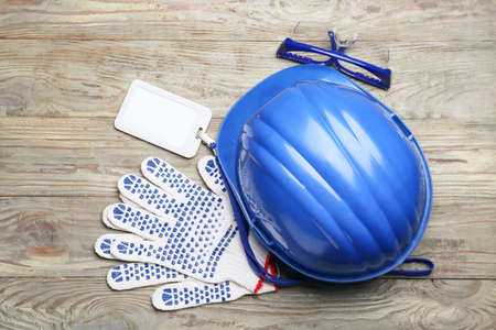 Safety equipment on wooden backgroundの写真素材