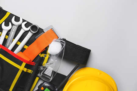 Bag with safety equipment on light backgroundの写真素材