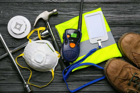 Safety equipment on dark wooden backgroundの写真素材