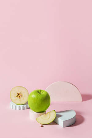 Composition with green apples on color backgroundの写真素材