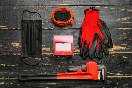 Safety equipment on dark wooden backgroundの写真素材