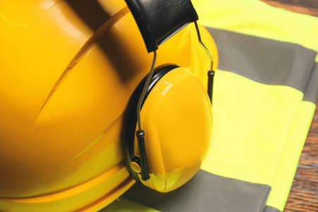 Safety equipment on wooden background, closeupの写真素材