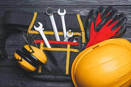 Bag with safety equipment on wooden backgroundの写真素材