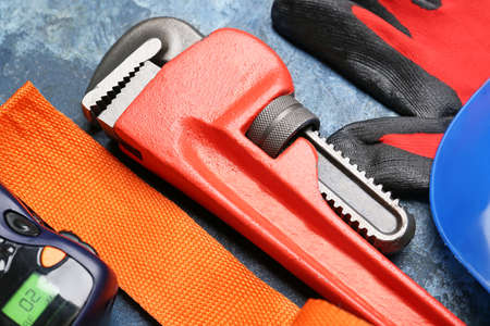 Safety equipment on color background, closeup