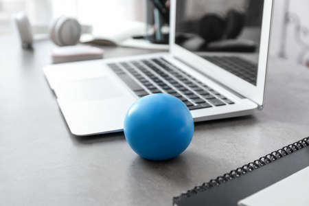 Stress ball on table in officeの写真素材