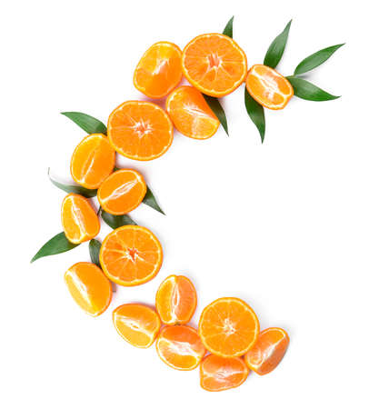 Letter C made of orange pieces on white backgroundの写真素材