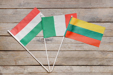 Different flags on wooden backgroundの写真素材