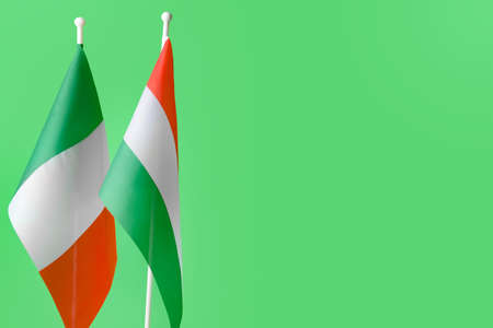 Flags of Italy and Hungary on color background, closeupの写真素材