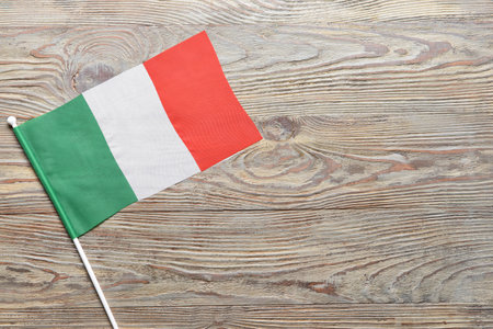 Italian flag on wooden backgroundの写真素材