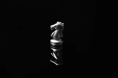 Chess piece on dark backgroundの写真素材