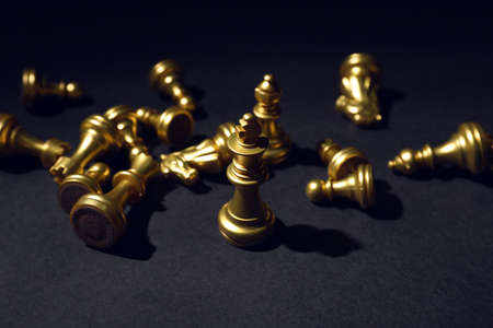 Chess pieces on dark background, closeupの写真素材