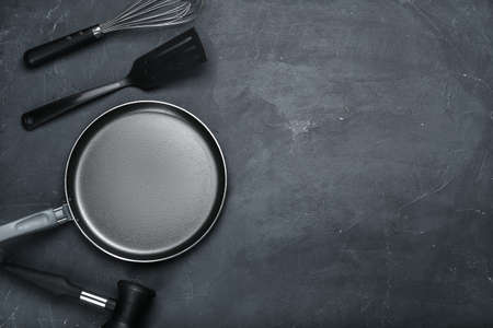 Set of kitchen utensils on dark backgroundの写真素材