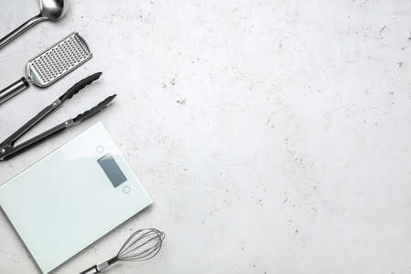 Set of kitchen utensils on light backgroundの写真素材