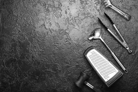 Set of kitchen utensils on dark backgroundの写真素材