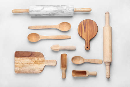 Set of kitchen utensils on light background