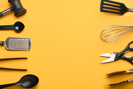 Set of kitchen utensils on color backgroundの写真素材
