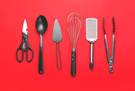 Set of kitchen utensils on color backgroundの写真素材