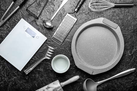 Set of kitchen utensils on dark backgroundの写真素材