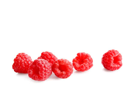 Tasty ripe raspberries on white background