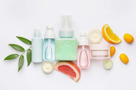 Natural cosmetic products with citrus fruits on white backgroundの写真素材
