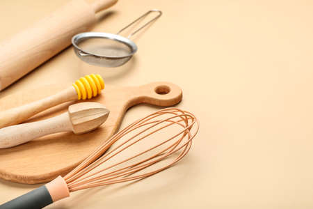 Set of kitchen utensils on color backgroundの写真素材