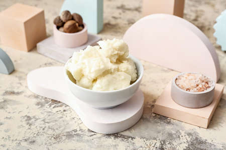 Composition with shea butter, nuts and sea salt on grunge backgroundの写真素材