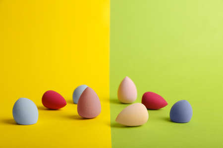 Different makeup sponges on color backgroundの写真素材