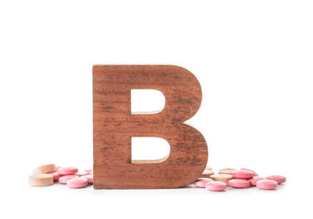 Vitamin B pills on white backgroundの写真素材