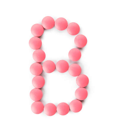 Vitamin B pills on white backgroundの写真素材