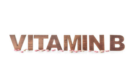 Text VITAMIN B with pills on white backgroundの写真素材