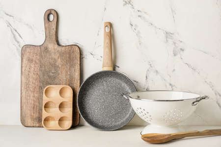 Set of kitchen utensils on light backgroundの写真素材