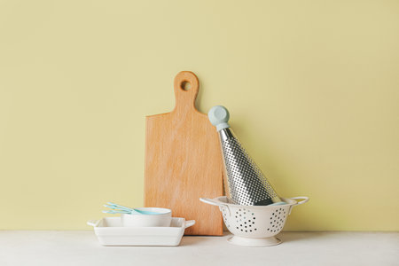 Set of kitchen utensils on color backgroundの写真素材