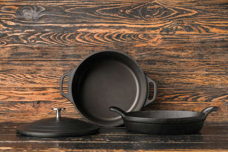 Set of kitchen utensils on dark wooden backgroundの写真素材