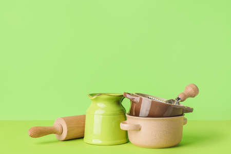 Set of kitchen utensils on color backgroundの写真素材