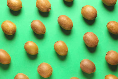 Tasty ripe kiwi on color backgroundの写真素材