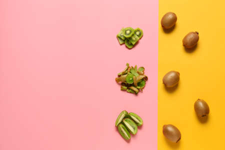 Composition with ripe kiwi on color backgroundの写真素材