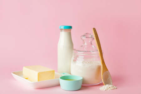 Ingredients for preparing bakery on color backgroundの写真素材