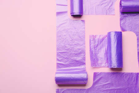 Rolls of garbage bags on color backgroundの写真素材
