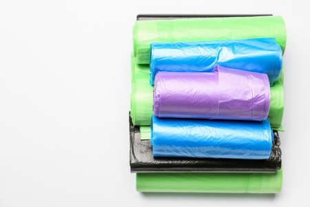 Rolls of garbage bags on white backgroundの写真素材